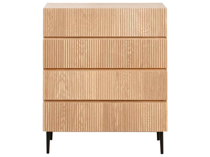 Wooden dresser with four drawers on a white background