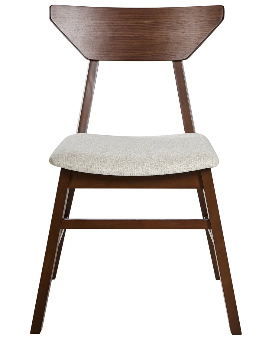 Solid wood dining chair in a walnut finish with a distinctive angular backrest and a padded beige fabric seat. Its clean lines and mid-century-inspired design make it a stylish and comfortable choice for modern dining spaces.