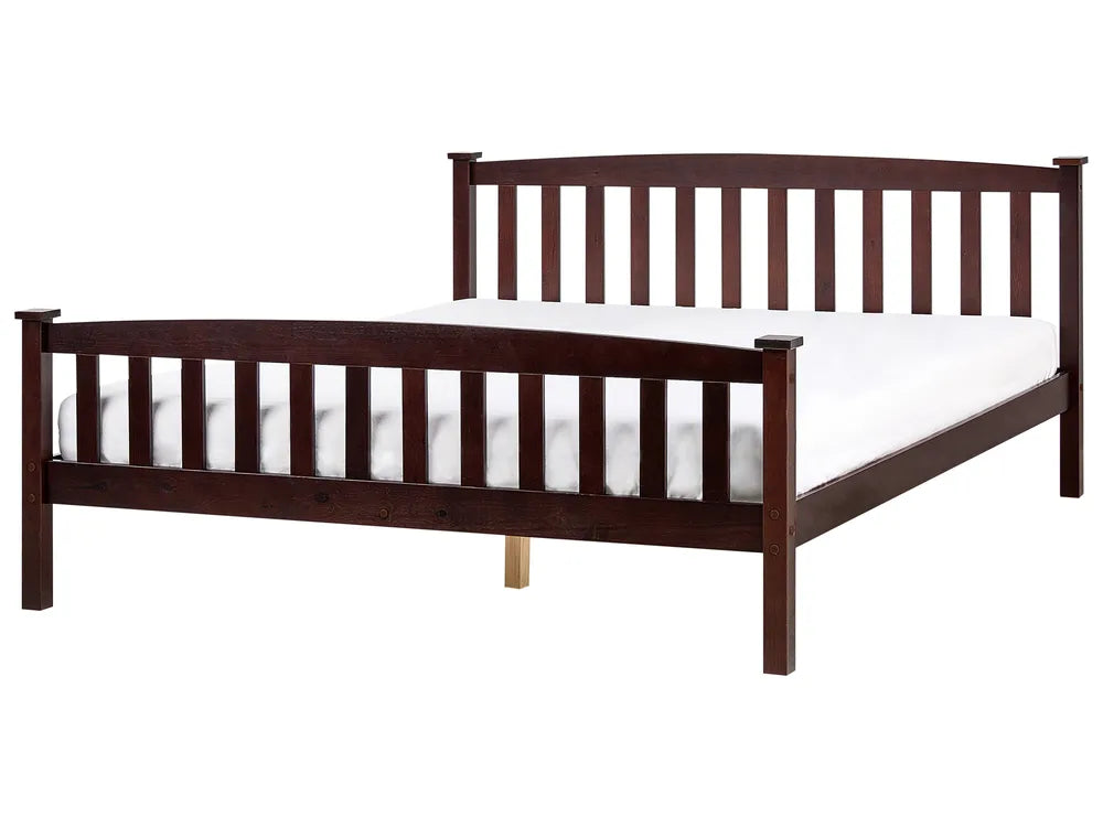 Wooden bed frame with white mattress on a white background
