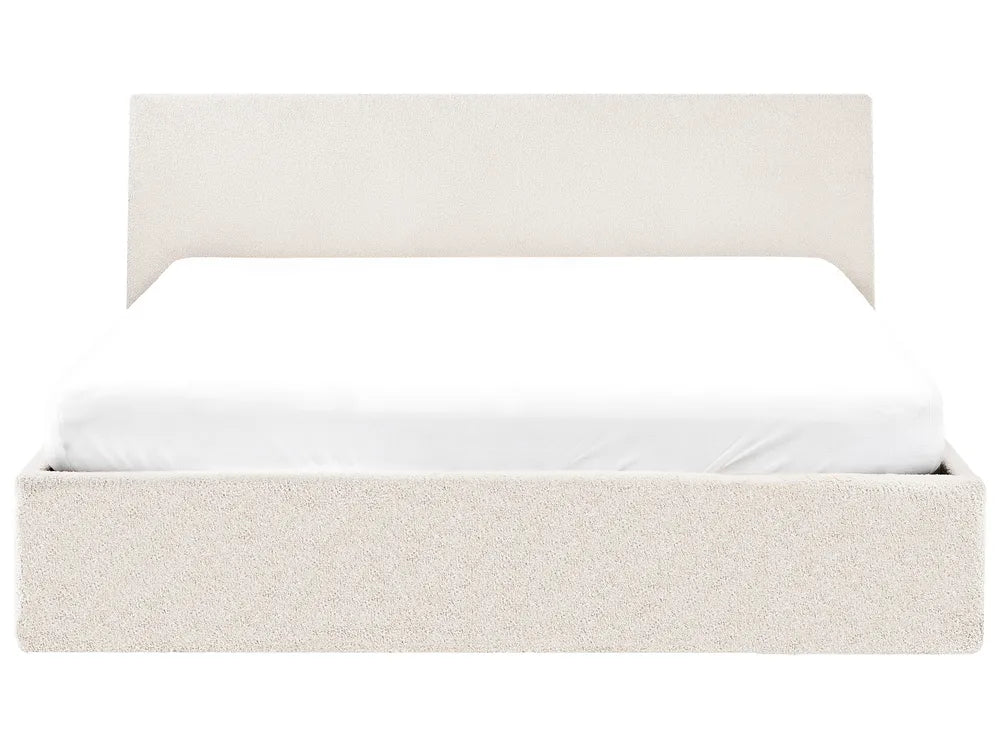 Beige upholstered bed frame with white mattress