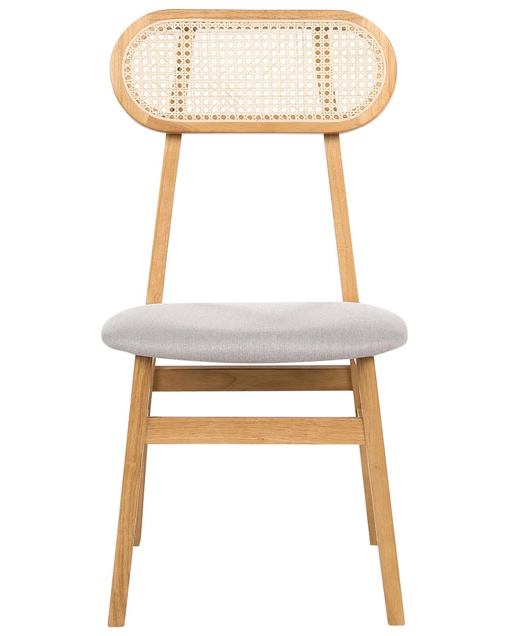 Natural wood dining chair with an oval cane backrest, soft light gray upholstered seat, and slim tapered legs, shown against a clean white background.