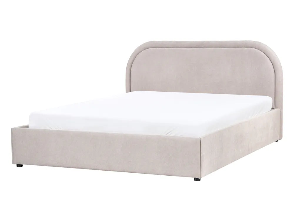 Beige upholstered bed with white mattress on a white background