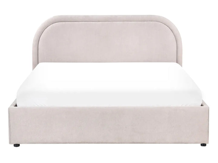 Beige upholstered bed with white mattress on a white background
