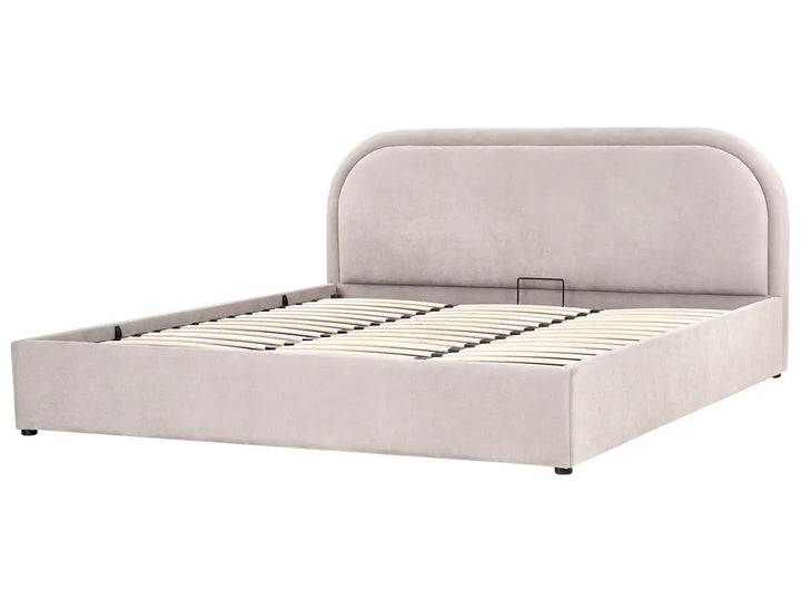 Beige upholstered bed frame on a white background