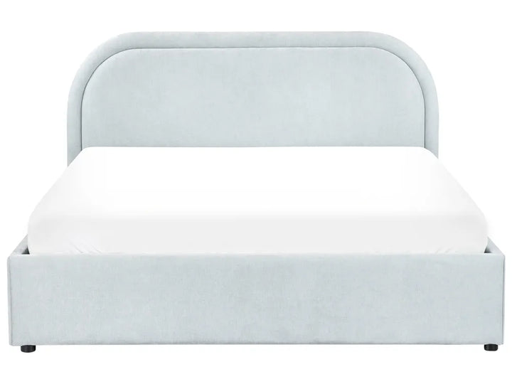 Light gray upholstered bed with white mattress on a white background