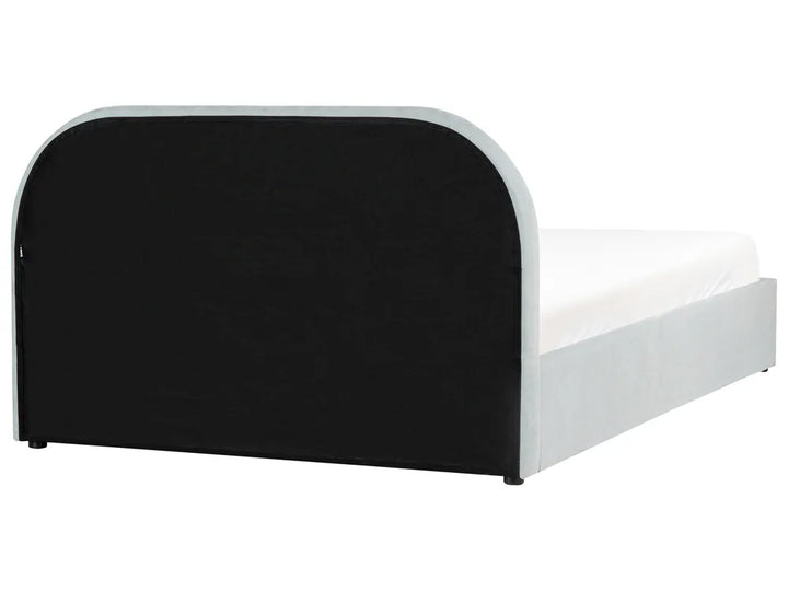 Bed with black headboard and white footboard on a white background