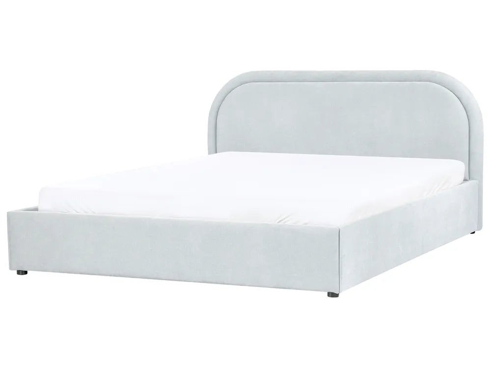 White bed frame with mattress on a white background
