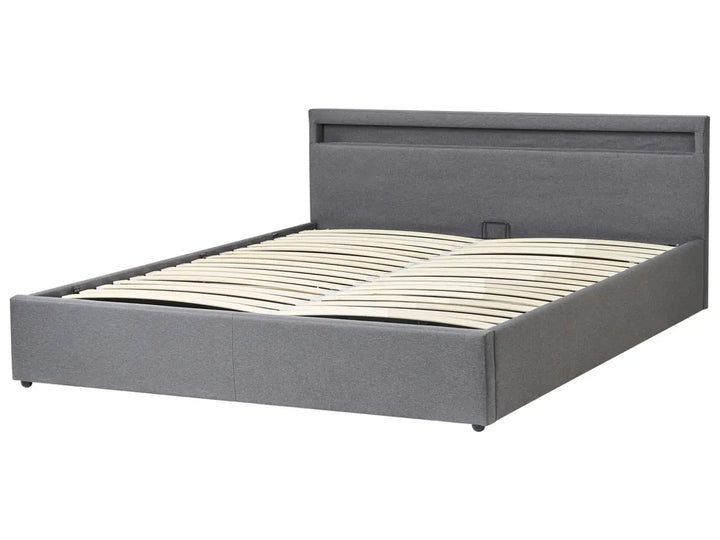 Gray upholstered bed frame on a white background