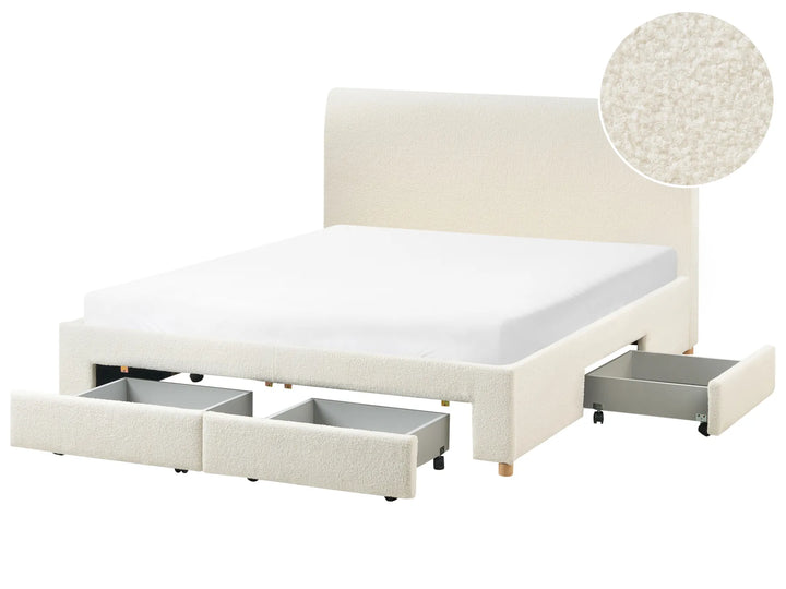 Beige upholstered bed with storage drawers on a white background