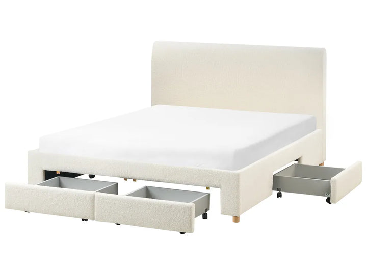 Beige upholstered bed with storage drawers on a white background