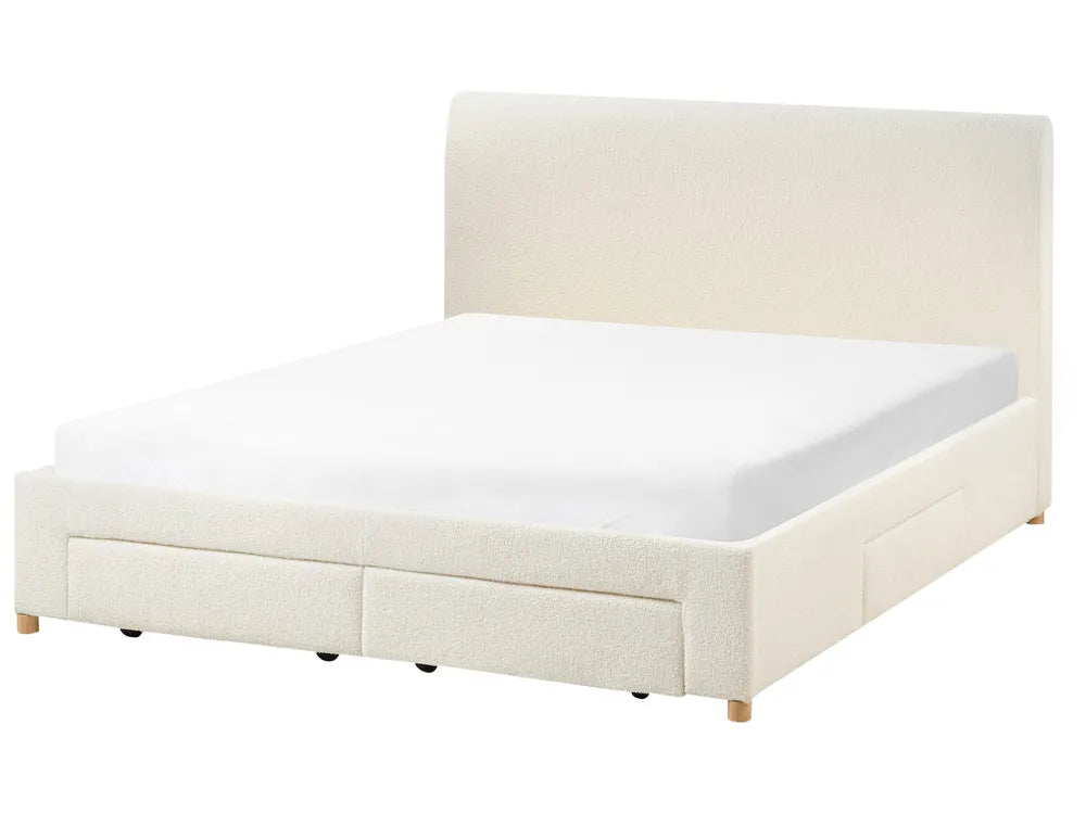 Beige upholstered bed with white mattress on a white background