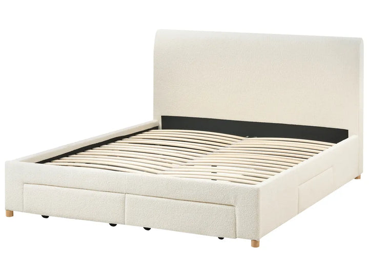 Beige upholstered bed frame with wooden slats on a white background