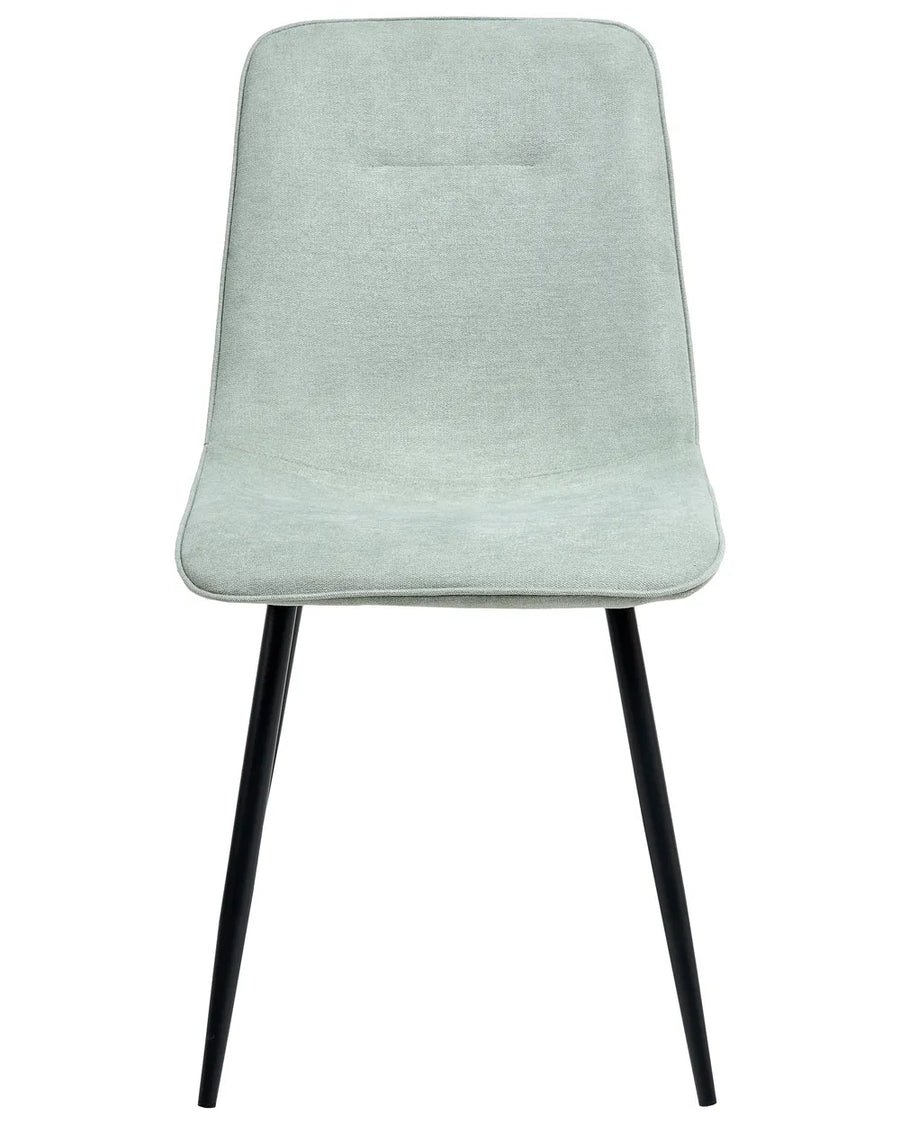 Light green upholstered dining chair with a slim silhouette, padded seat and backrest, and sleek black metal legs.
