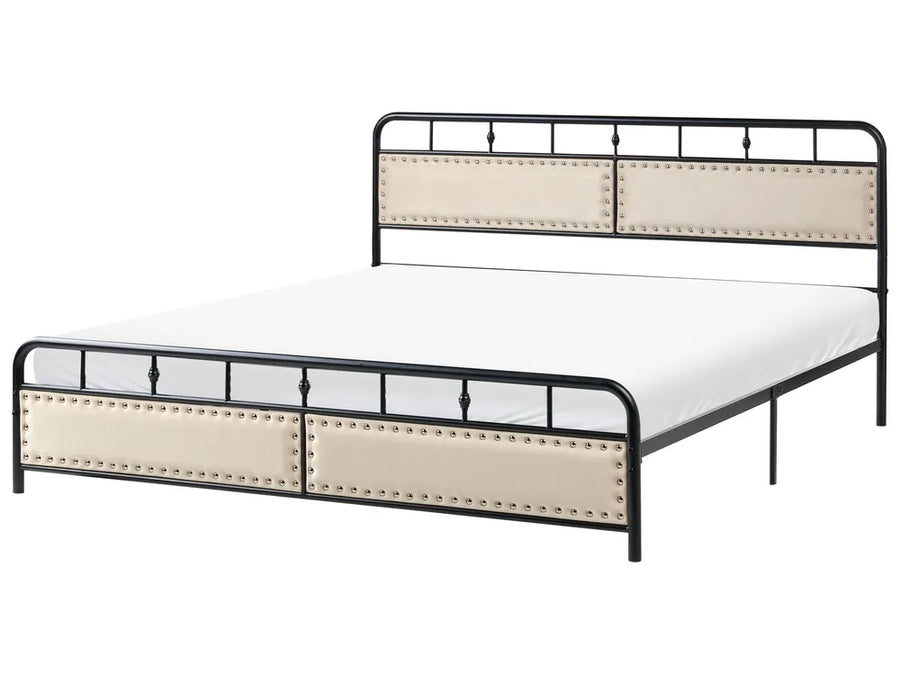 Black metal bed with upholstered panels and rivets