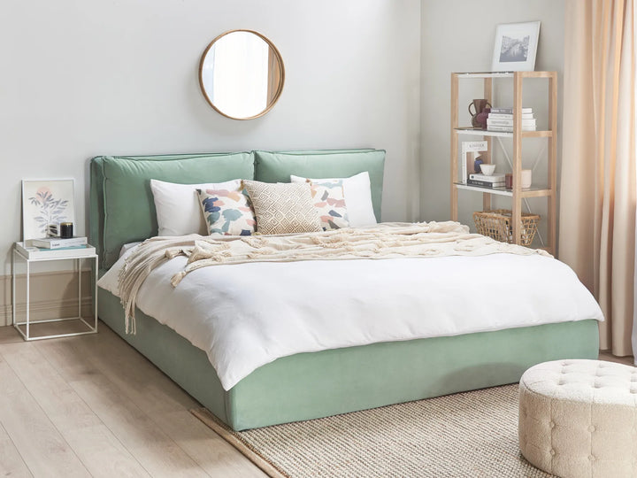 Super King green velvet bed with padded headboard