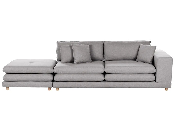 Gray sofa with a chaise lounge on a white background