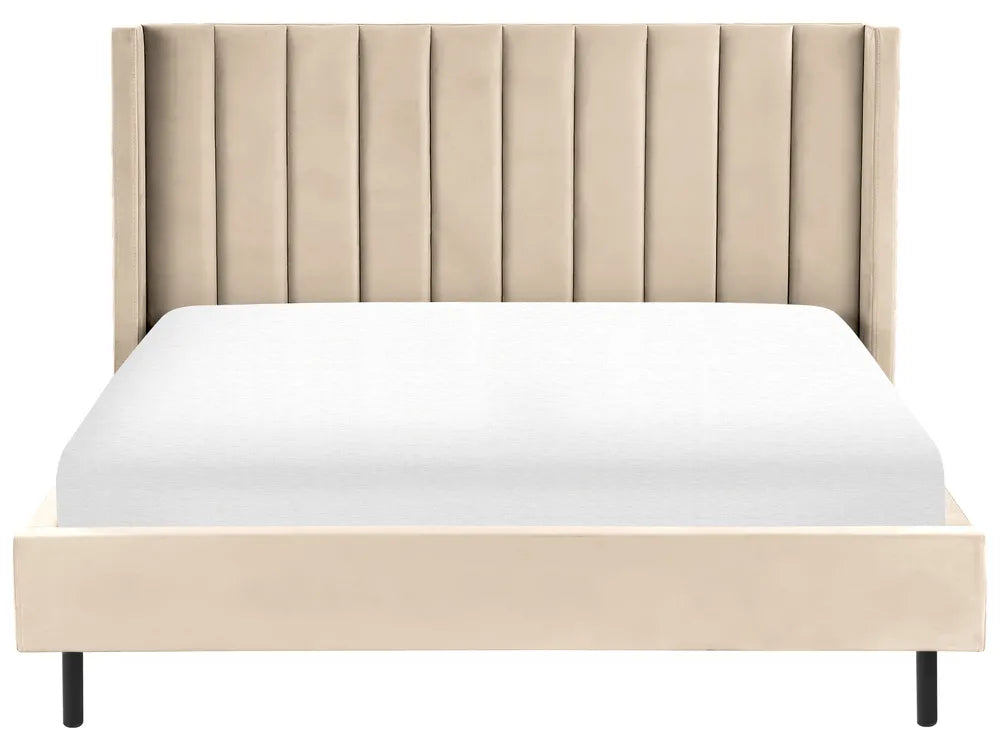 Beige upholstered bed with white mattress on a white background