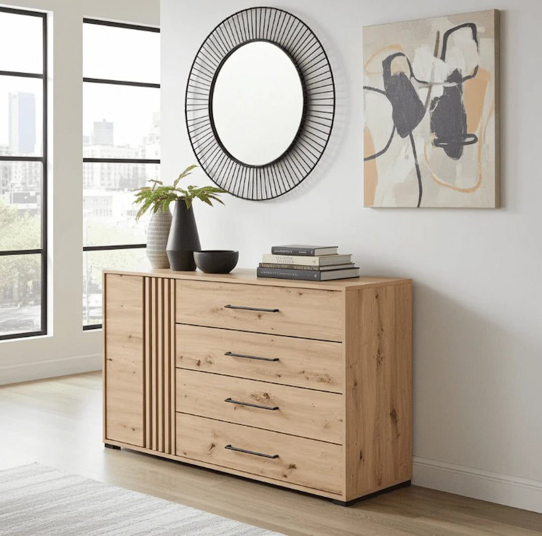 Wooden dresser in a room with a mirror and abstract painting on the wall.