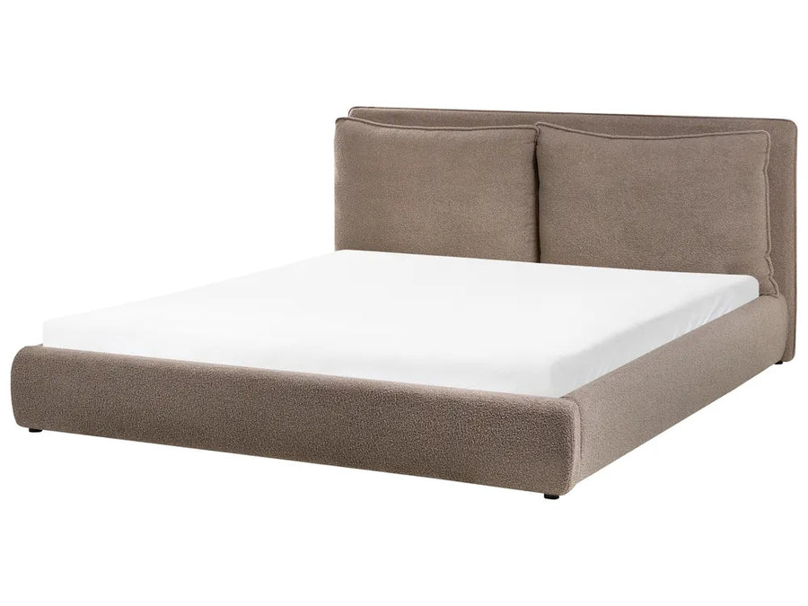 Brown upholstered bed with white mattress on a white background