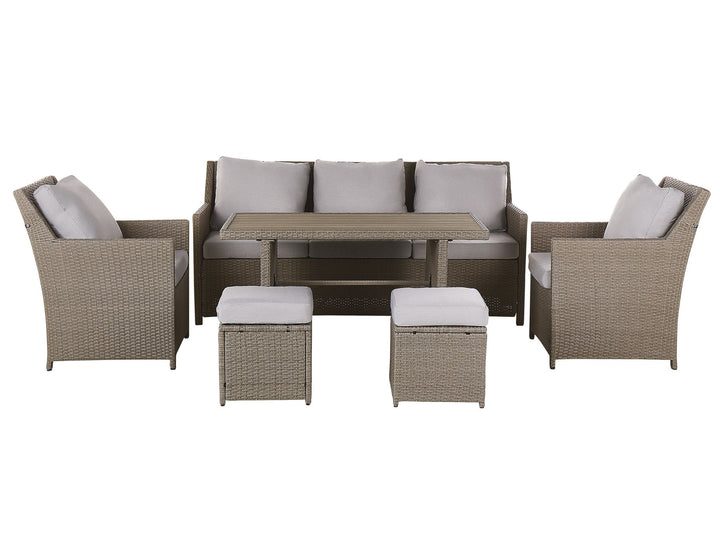 Outdoor furniture set with chairs, table, and ottomans on a white background