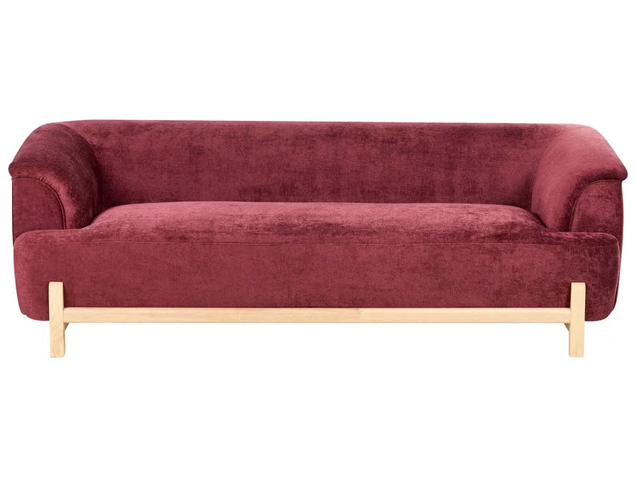 Red sofa with wooden legs on a white background
