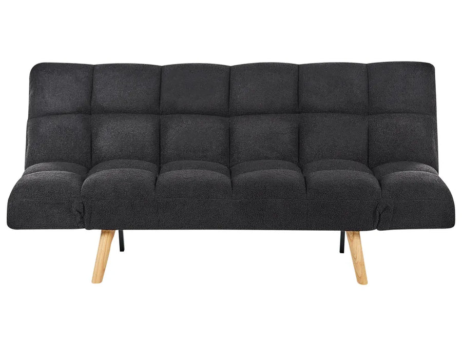 Black sofa bed with wooden legs on a white background