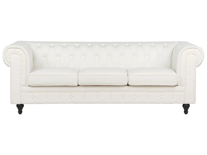 White tufted sofa on a white background