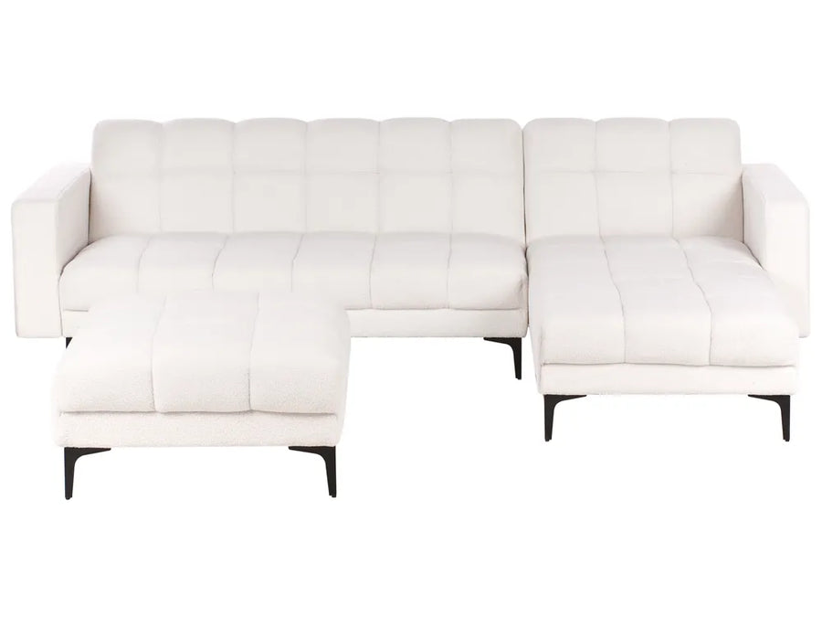 White sectional sofa on a white background