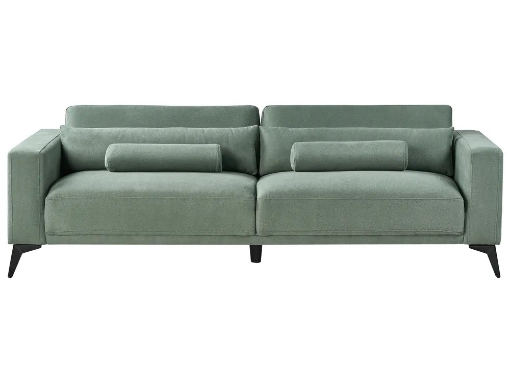 Green sofa with cushions on a white background