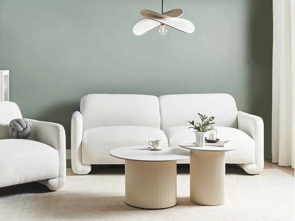 White fabric 3-seater sofa with wide backrest and padded armrests