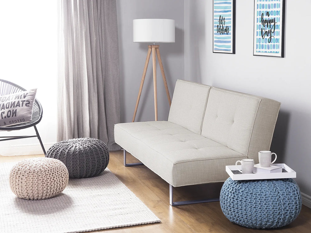 Comfortable 3-seater sofa bed in light beige fabric