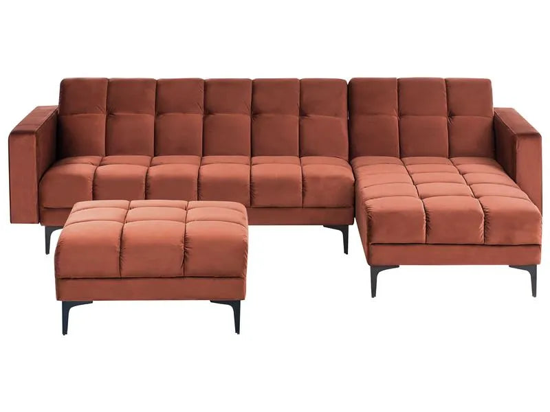 Brown sectional sofa with ottoman on a white background