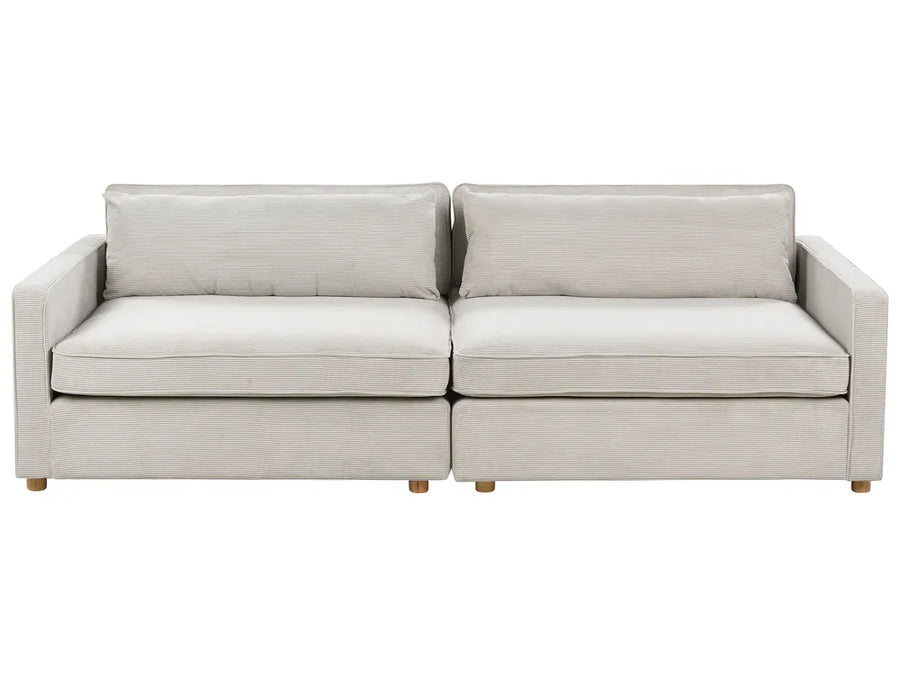 Beige sectional sofa on a white background