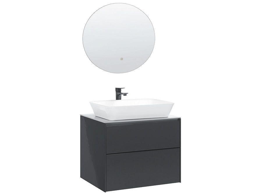 Bathroom vanity with white sink and round mirror on a white background