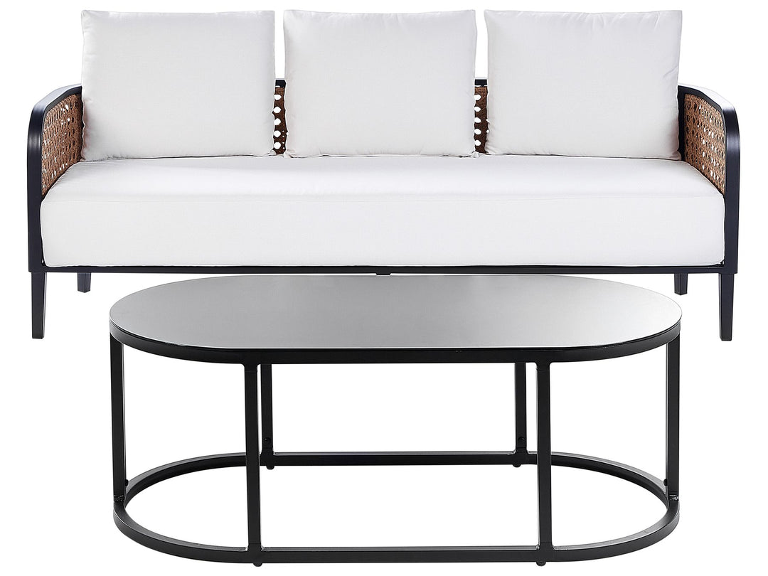Outdoor sofa with white cushions and a matching round table on a white background