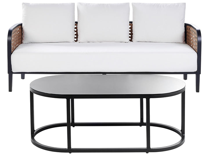 Outdoor sofa with white cushions and a matching round table on a white background