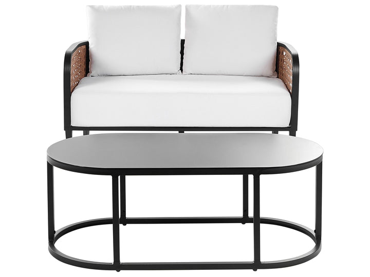 Modern outdoor furniture set with a sofa and round table on a white background