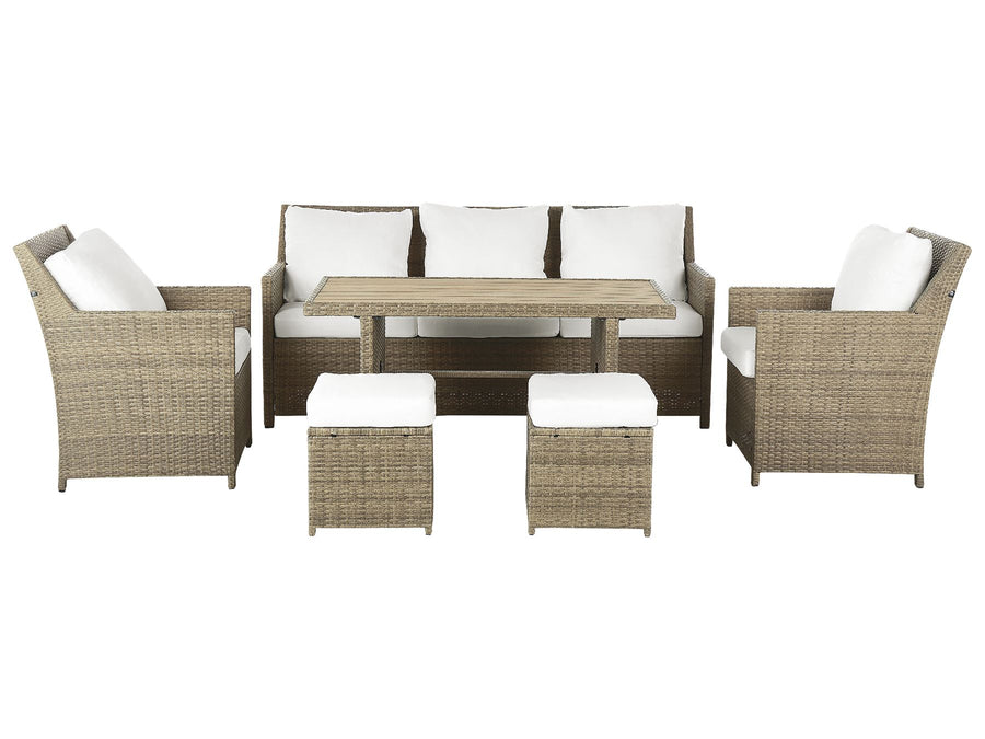 Outdoor furniture set with wicker chairs, table, and ottomans on a white background
