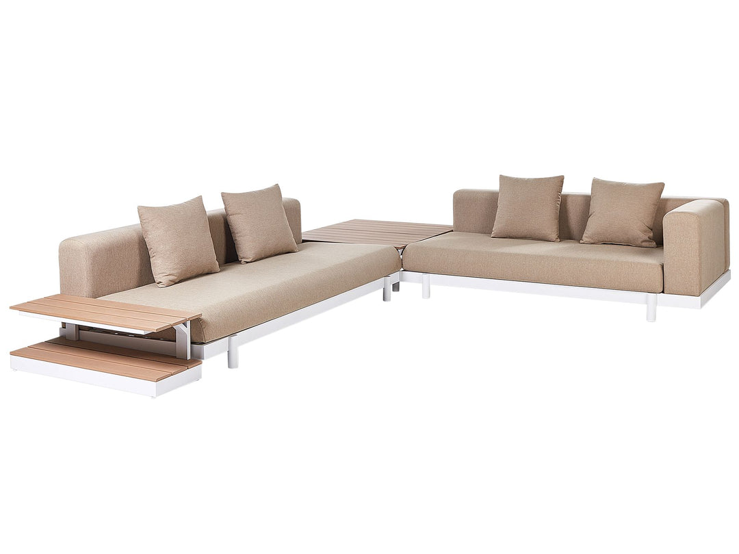 Beige sectional sofa with wooden table extension on a white background