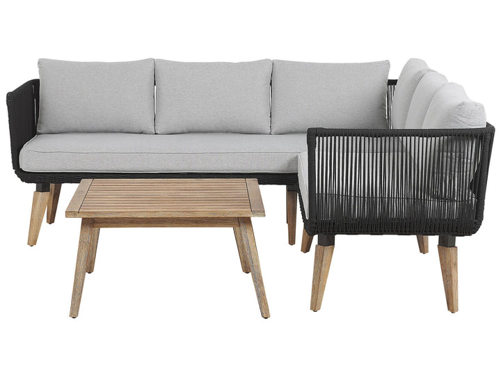 Outdoor furniture set with a sofa, chair, and table on a white background