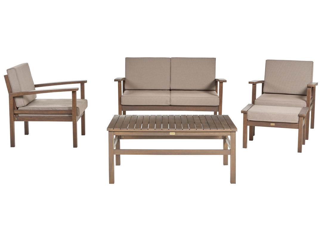 Outdoor furniture set with a sofa, two armchairs, and a coffee table on a white background