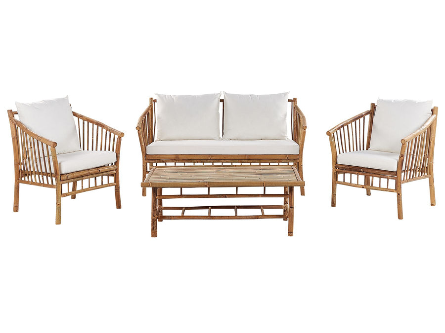 Rattan outdoor furniture set with white cushions on a white background