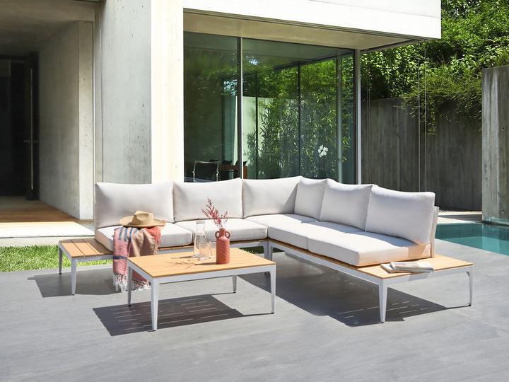 Modern outdoor sofa set with coffee table on a patio
