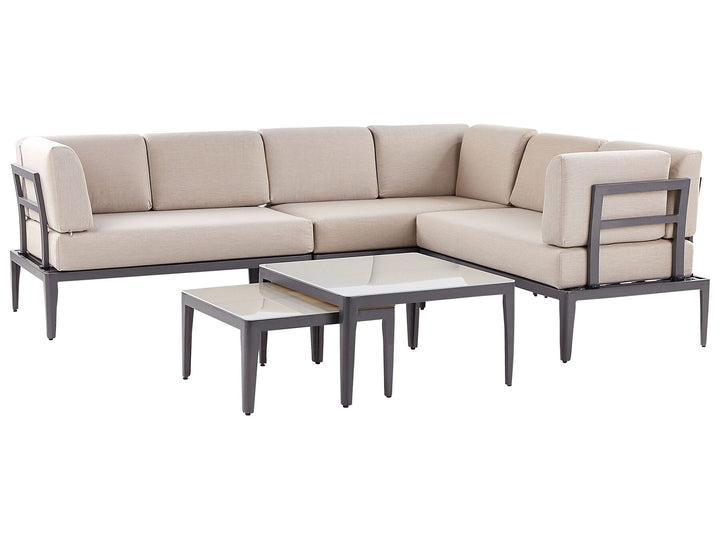 Beige sectional sofa with two coffee tables on a white background