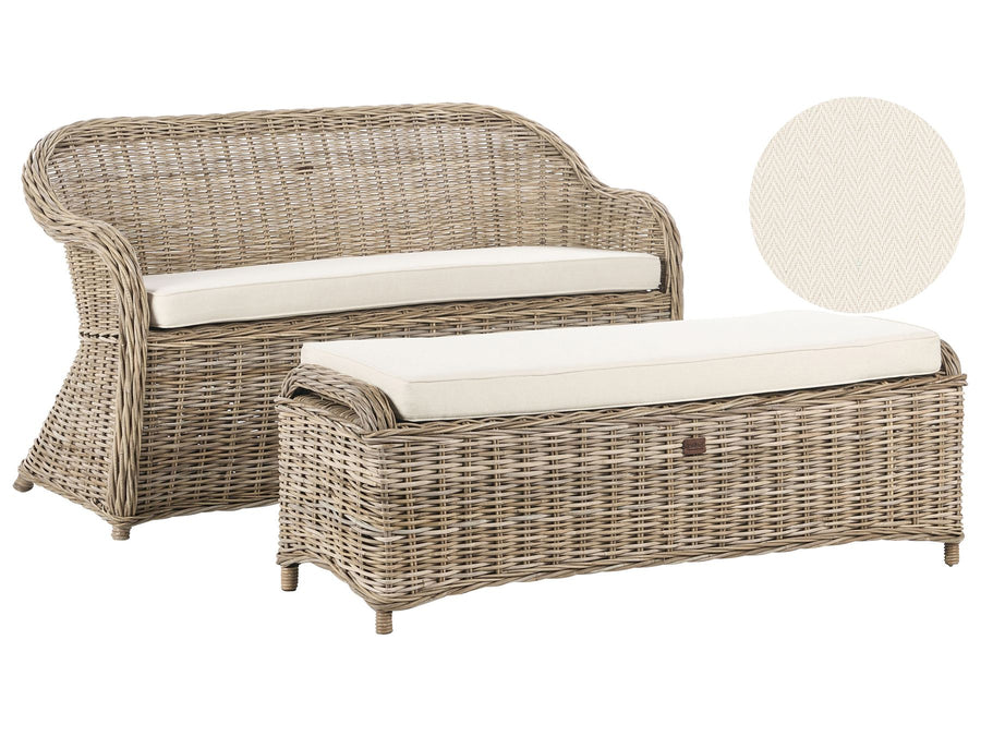 Wicker outdoor furniture set with cushions on a white background