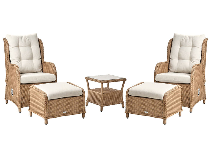 Outdoor furniture set with two chairs, ottoman, and small table on a white background