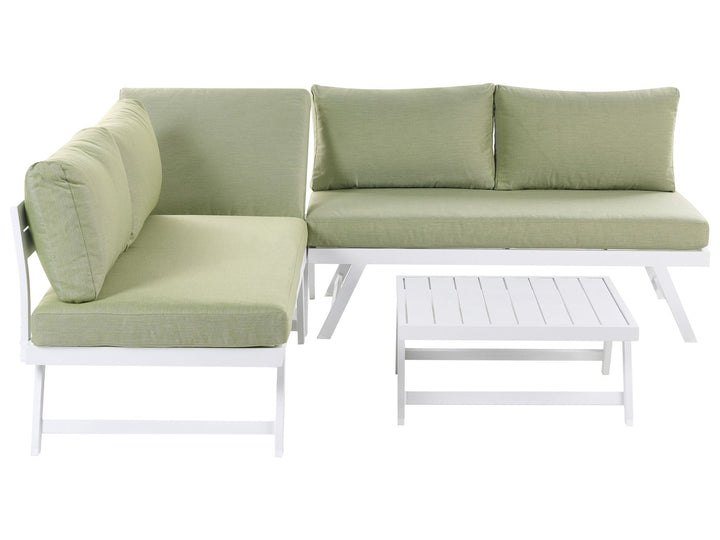 Green sectional sofa with white frame and base on a white background