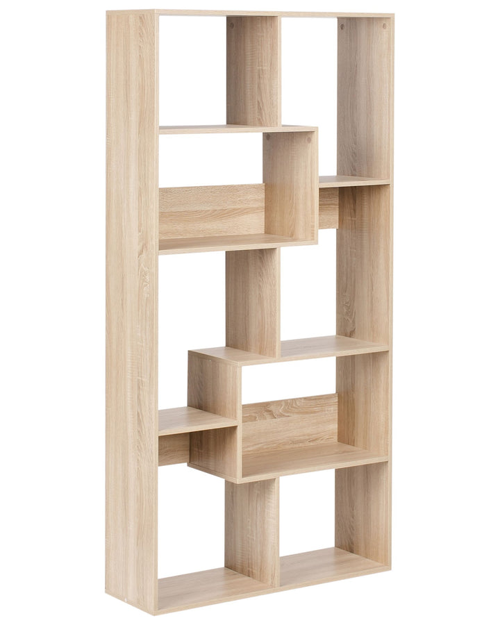 Wooden bookshelf with geometric design on a white background
