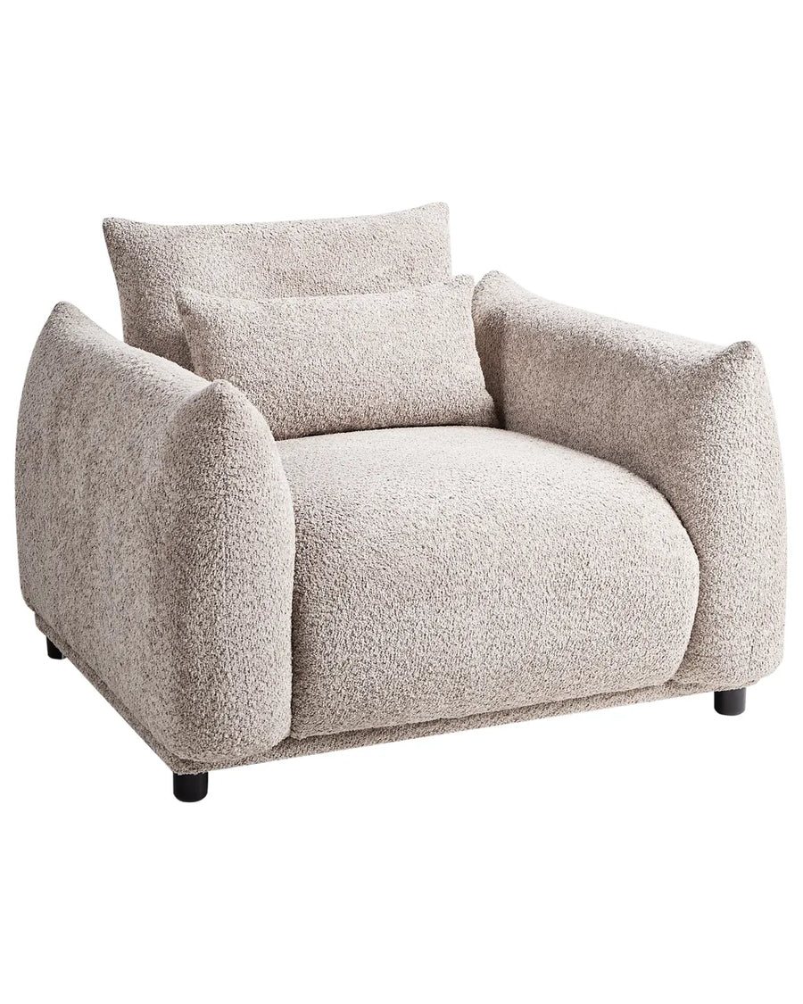 Beige armchair with cushions on a white background