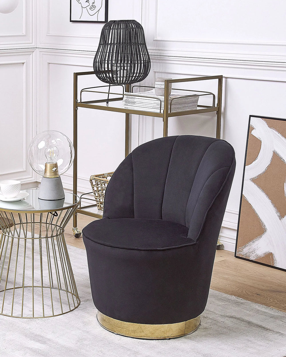 Black armchair in a stylish room with decor elements